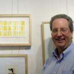 Bill Brookover with his print Yellow Window #1 at Surface and Tension Print Exhibition