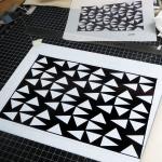 design studies with black and white triangles on the work desk, by Bill Brookover