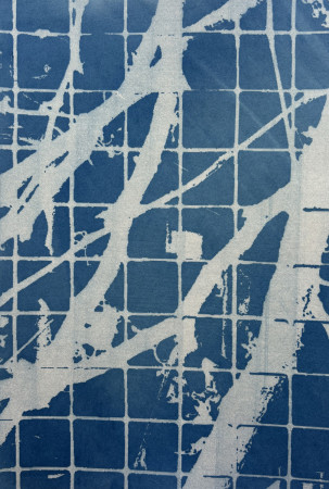 white vines moving across a grid of small blue squares