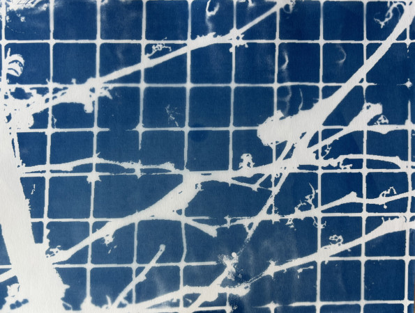 white vines moving across a grid of small blue squares