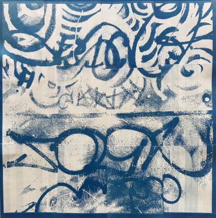 blue graffiti lines and text across a white background